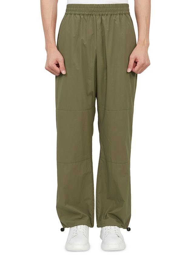 STUDIO NICHOLSON - Zephyr Track Pants OliveZEPHYR SNM 920 OLIVE - BALAAN