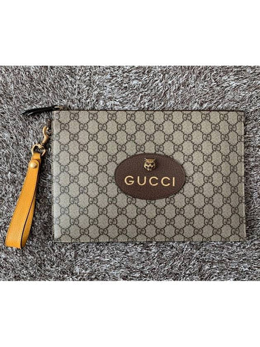 GG Supreme Jaguar gold clutch bag - GUCCI - BALAAN 1