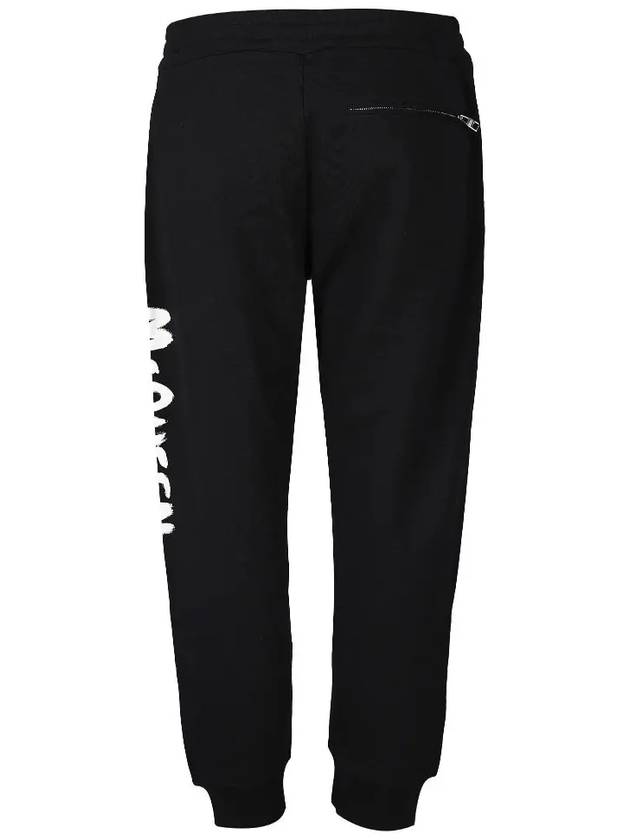 Graffiti Logo Track Pants Black - ALEXANDER MCQUEEN - BALAAN.