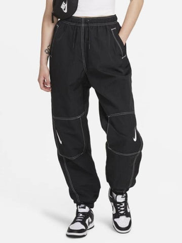 01 DR6204 010 Women’s Swoosh Repel Pants Black - NIKE - BALAAN 1