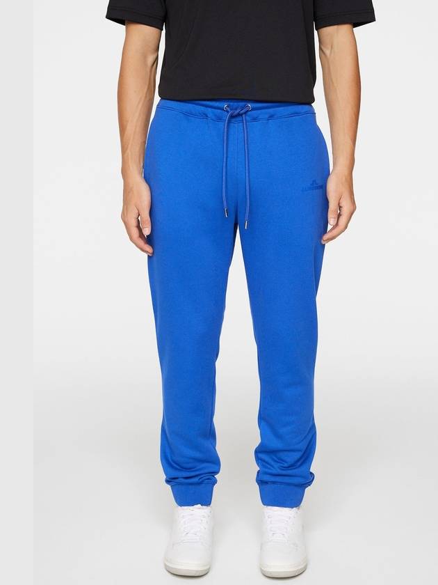 Alpha Track Pants Club Blue - J.LINDEBERG - BALAAN 3