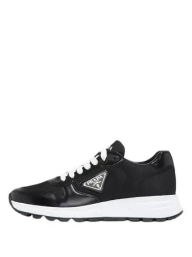 Triangular logo low sneakers - PRADA - BALAAN 1