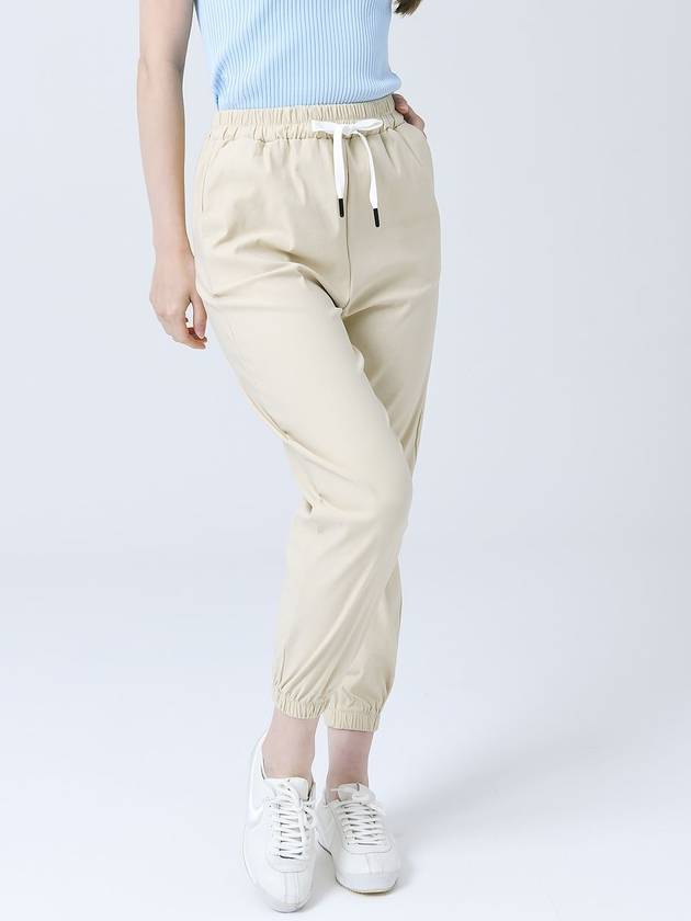 Poly Span Waist Full Banding String Beige Jogger Pants DO3242JOPT001 1 - DOYOUKNOWMC GOLF WEAR - BALAAN 1