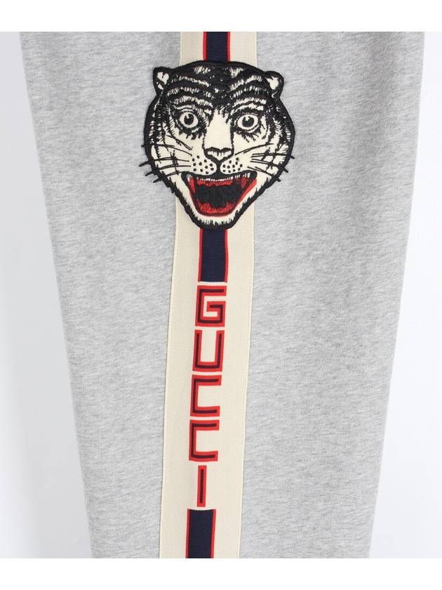 Tiger logo jogger pants - GUCCI - BALAAN 5