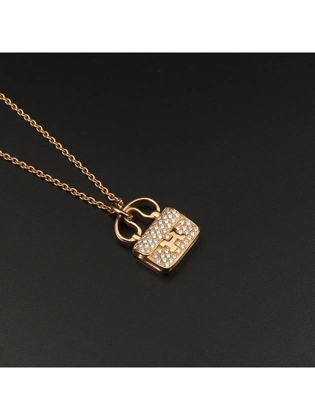 18K 750 yellow gold 0 29CT diamond Constance amulet pendant necklace H109615 - HERMES - BALAAN 3