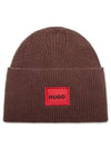 Green Ribbed beanie hat with red logo label 50496011 202 - HUGO BOSS - BALAAN 2