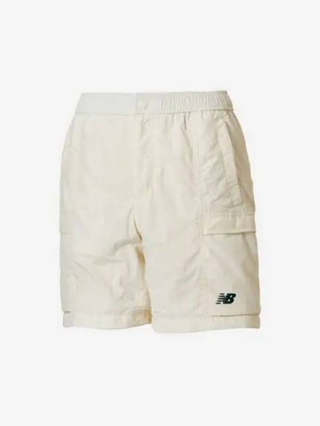 Uni NBSC 4 5 Woven Shorts 64 Cream - NEW BALANCE - BALAAN 1