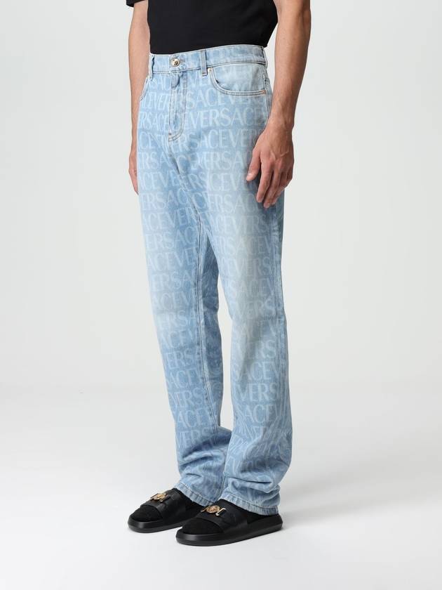 Jeans Versace in denim logato - VERSACE - BALAAN 4