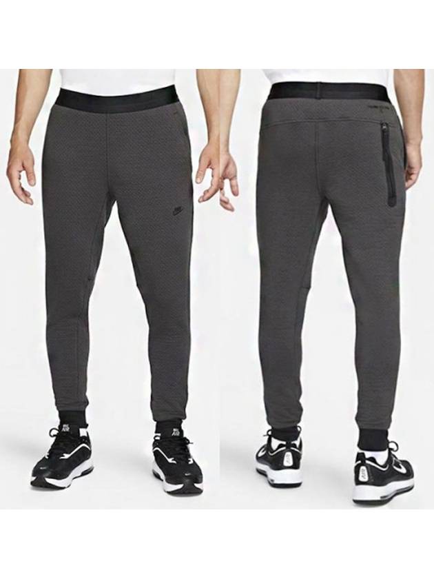 01DD6626060Therma Fit ADV Tech Pack PantsCharcoal - NIKE - BALAAN 1