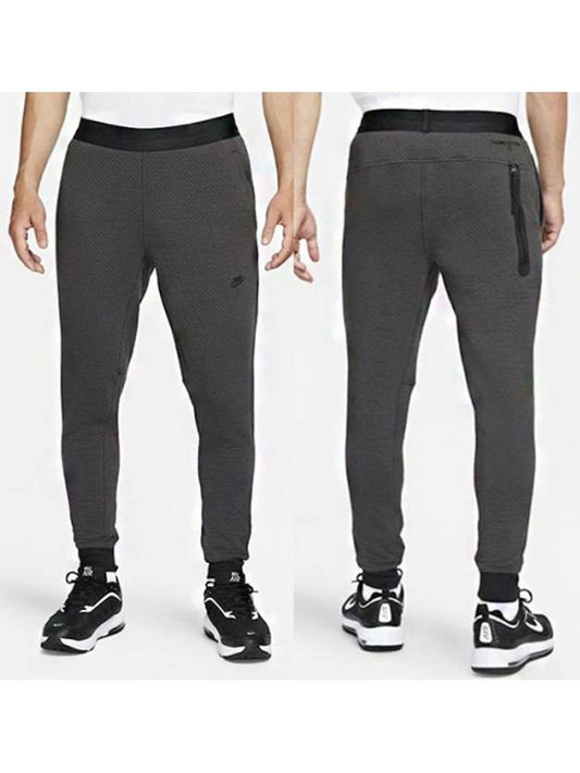 01DD6626060Therma Fit ADV Tech Pack PantsCharcoal - NIKE - BALAAN 1