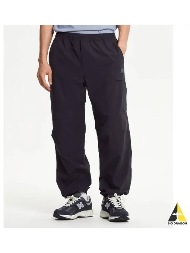 NBNTE31803 UNI ESS Warm up Jogger Pants CHARCOAL - NEW BALANCE - BALAAN 1