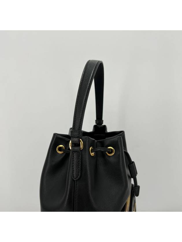 Leather triangle logo bucket bag black - PRADA - BALAAN 8