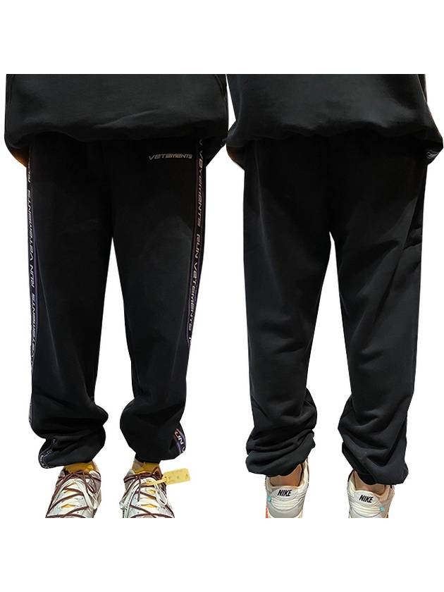 Men's Logo Tape Track Pants Black - VETEMENTS - BALAAN.