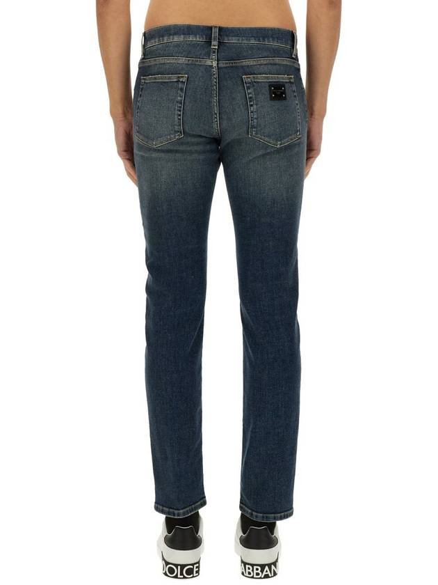 Blue Distressed Slim-Fit Jeans in Cotton Denim Man - DOLCE&GABBANA - BALAAN 4