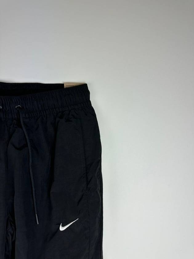 Sportswear Collection Mid-Rise Repel Zip Track Pants Black - NIKE - BALAAN 4