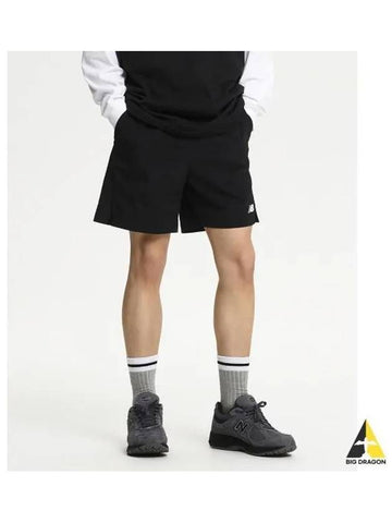 NBNVE22523 UNI NBSC 4 part woven short pants BLACK - NEW BALANCE - BALAAN 1