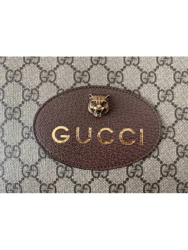 GG Supreme Jaguar gold clutch bag - GUCCI - BALAAN 4