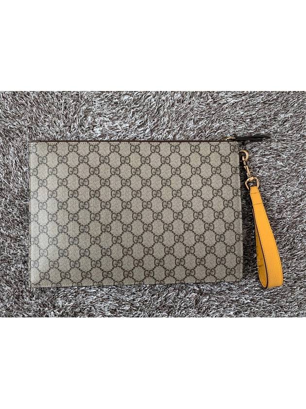 GG Supreme Jaguar gold clutch bag - GUCCI - BALAAN 3