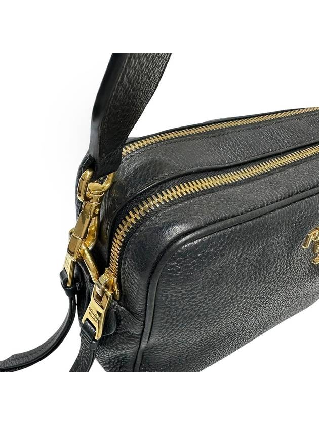 1BH089 Black leather Vitello gold lettering camera cross bag - PRADA - BALAAN 7