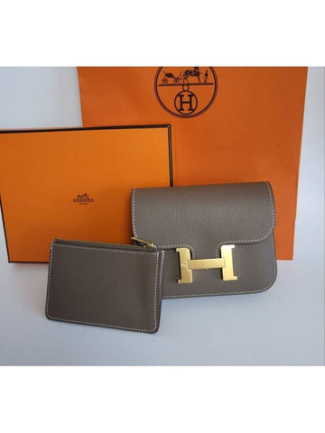 2023 Constance slim compact half wallet belt bag Etoffe gold women's wallet H082214 - HERMES - BALAAN 1