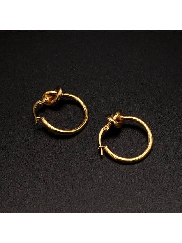 Gold Finish Brass Knot Small Hoop Earrings 46N556BRA 35OR - CELINE - BALAAN 1