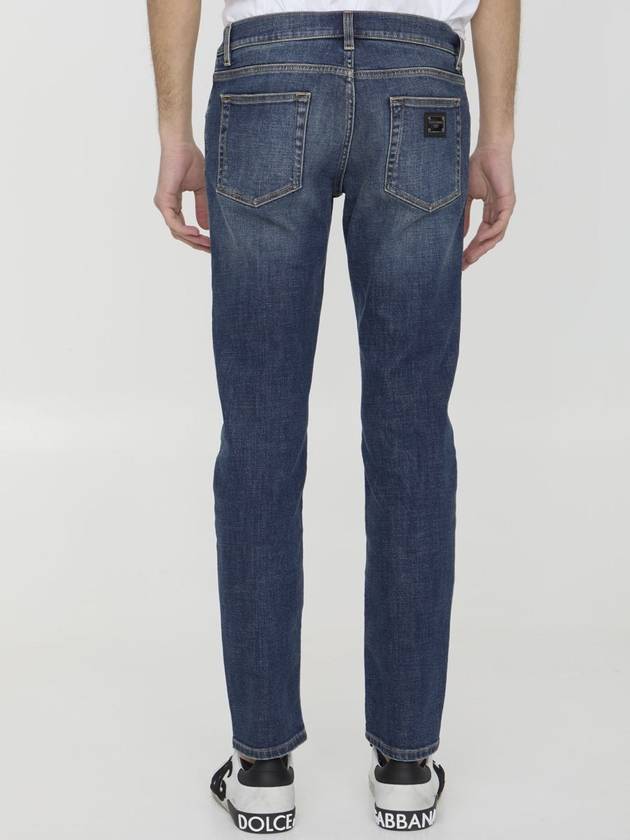 Blue Distressed Slim-Fit Jeans in Cotton Denim Man - DOLCE&GABBANA - BALAAN 5