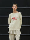 Minnie wearing ANC EMBROIDERY BOATNECK KNIT IVORY - ANOETIC - BALAAN 6