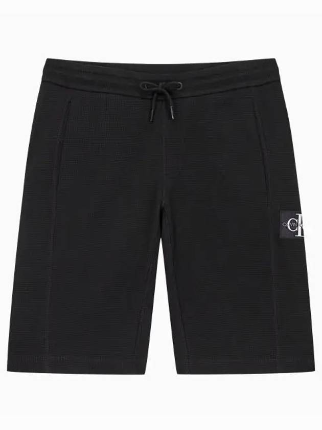 JEANS Men s Black Monogram Badge Logo Waffle Sweat Short Pants J317986 BEH - CALVIN KLEIN - BALAAN 2