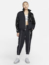 Women's Sportswear Icon Clash Woven Track Pants Black - NIKE - BALAAN.