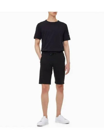 JEANS Men s Black Monogram Badge Logo Waffle Sweat Short Pants J317986 BEH - CALVIN KLEIN - BALAAN 1