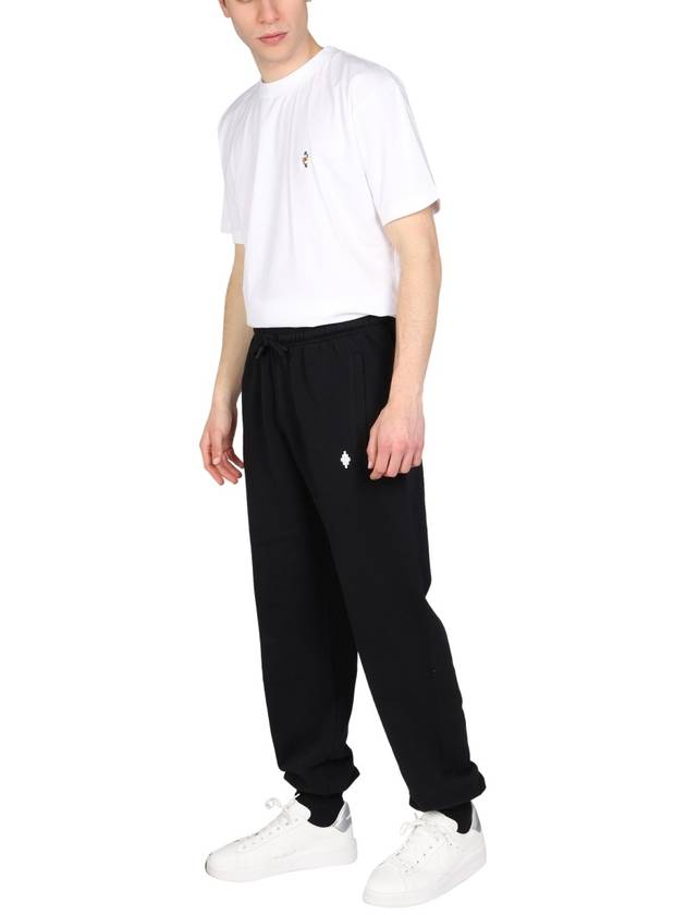 Cross Relaxed Drawstring Track Pants Black - MARCELO BURLON - BALAAN 3