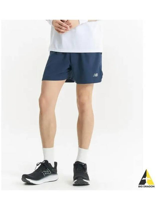 NBNVE2P091 MEN RC 4 quarter short pants NAVY - NEW BALANCE - BALAAN 1