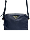 Women s 1BH089 Black Pocono Nylon Gold Triangular Logo Cross Bag - PRADA - BALAAN 1