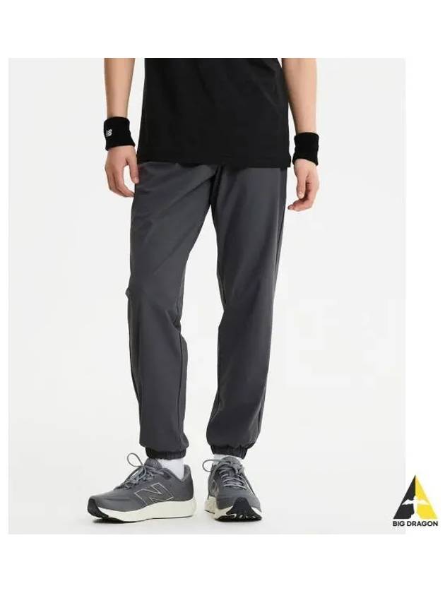 NBMLE22433 UNI Tricoat Jogger Pants DGRAY - NEW BALANCE - BALAAN 1