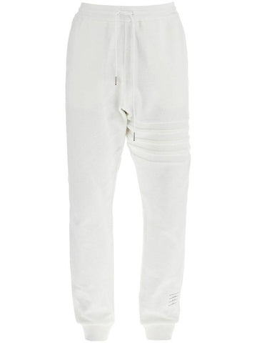 white cotton sweatpants with 4 stripes - THOM BROWNE - BALAAN 1