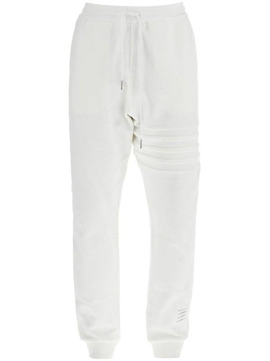 white cotton sweatpants with 4 stripes - THOM BROWNE - BALAAN 1