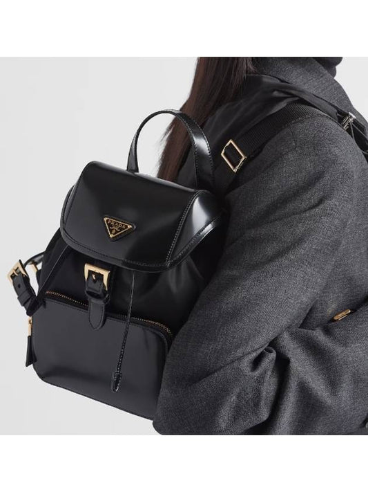 Triangular logo Re nylon leather Jo Yeo jeong gold plated backpack common 1BZ074 R789 F0002 V - PRADA - BALAAN 1