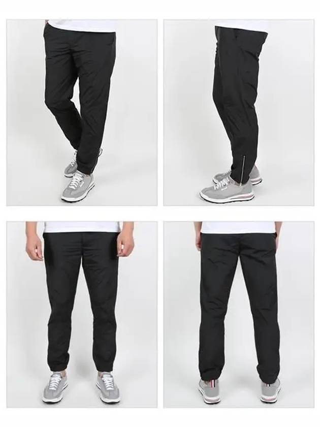 Logo Zipper Cuff Straight Pants Black - PRADA - BALAAN 3