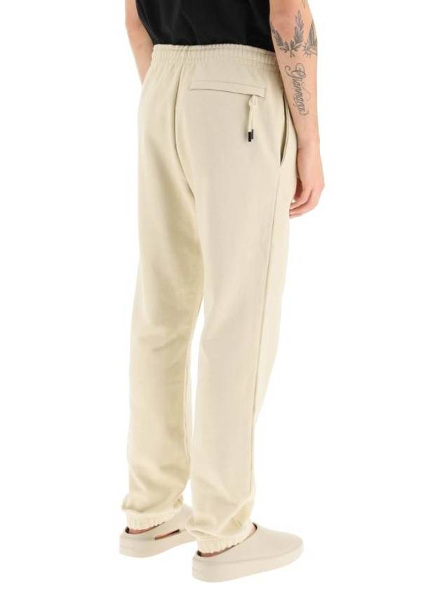 Le Jogging Logo Print Cotton Track Pants Light Beige - JACQUEMUS - BALAAN 4