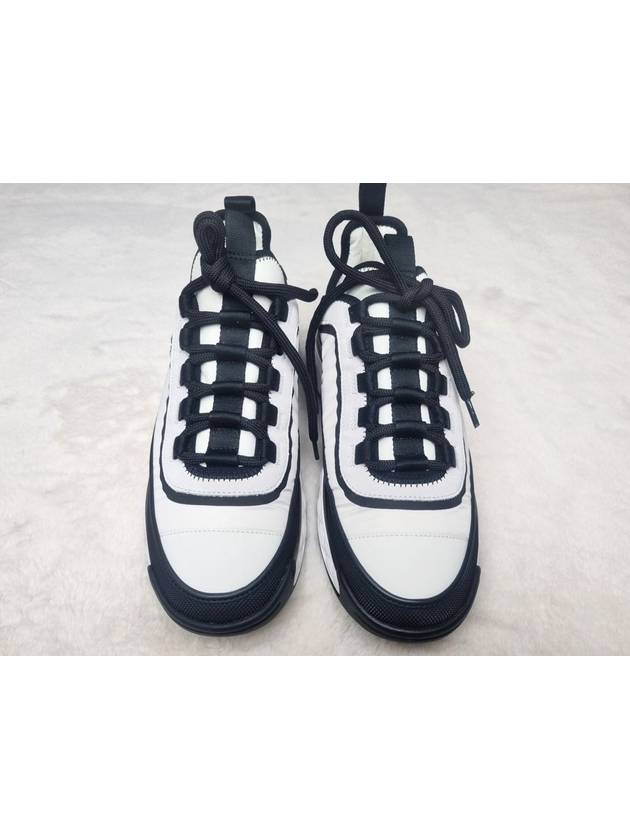 CC Logo Mixed Fiber Low Top Sneakers Black White - CHANEL - BALAAN 6