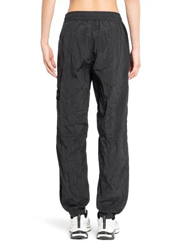 31019 Nylon Metal Econyl Track Pants Black - STONE ISLAND - BALAAN 3