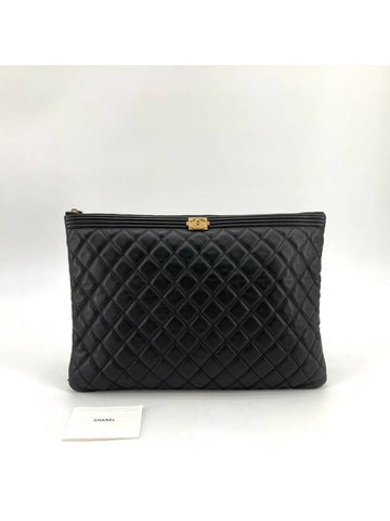 Lambskin gold boy clutch large - CHANEL - BALAAN 1