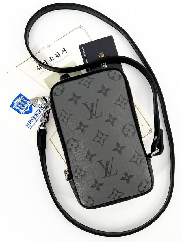 Reverse Monogram Phone Holder Cross Bag M69534 - LOUIS VUITTON - BALAAN 1