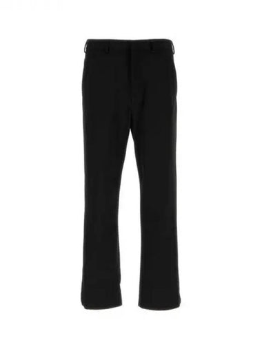 Back triangle logo stretch pants 271179 - PRADA - BALAAN 1