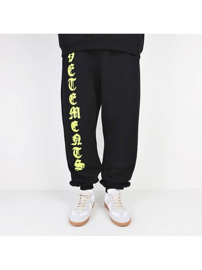 Anarchy Neon Logo Track Pants Black - VETEMENTS - BALAAN 2