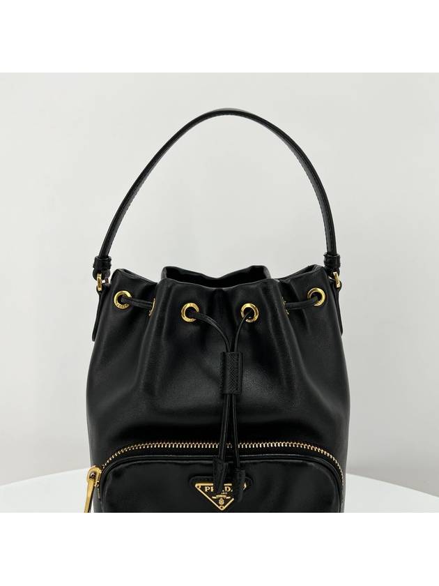 Leather triangle logo bucket bag black - PRADA - BALAAN 7