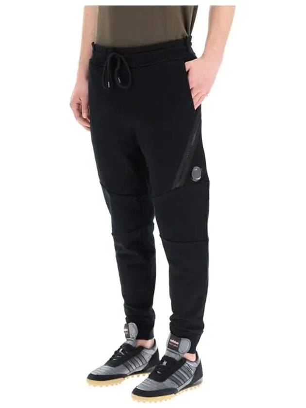 Diagonal Raised Fleece Zipped Track Pants Black - CP COMPANY - BALAAN 6