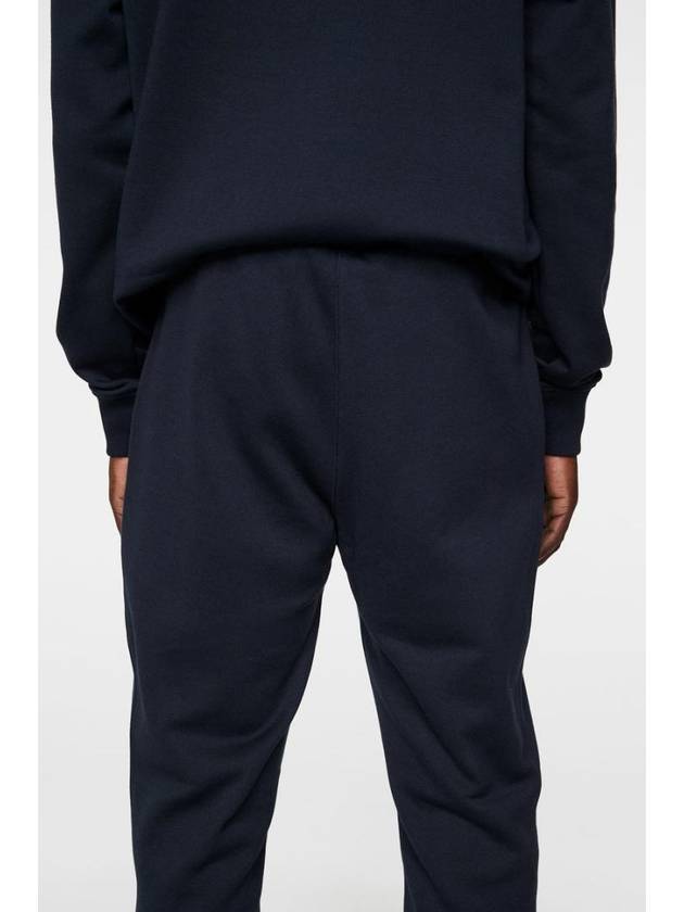 Alpha Track Pants Navy - J.LINDEBERG - BALAAN 5