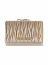 Matelasse bifold wallet gold - MIU MIU - BALAAN.