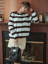 Minnie wearing STRIPE KNIT CARDIGAN BROWN - ANOETIC - BALAAN 2